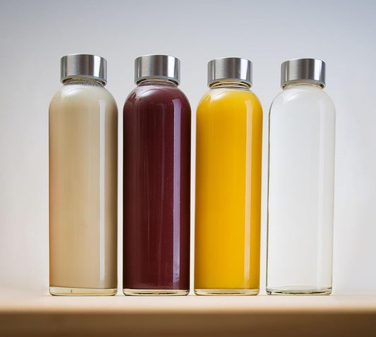 Epica 18-Oz Glass Water Bottles with Lids, Juice Bottles - BPA Free & Eco-Friendly Reusable Refillable Bottles for Juicing, Set of 4 - Clear