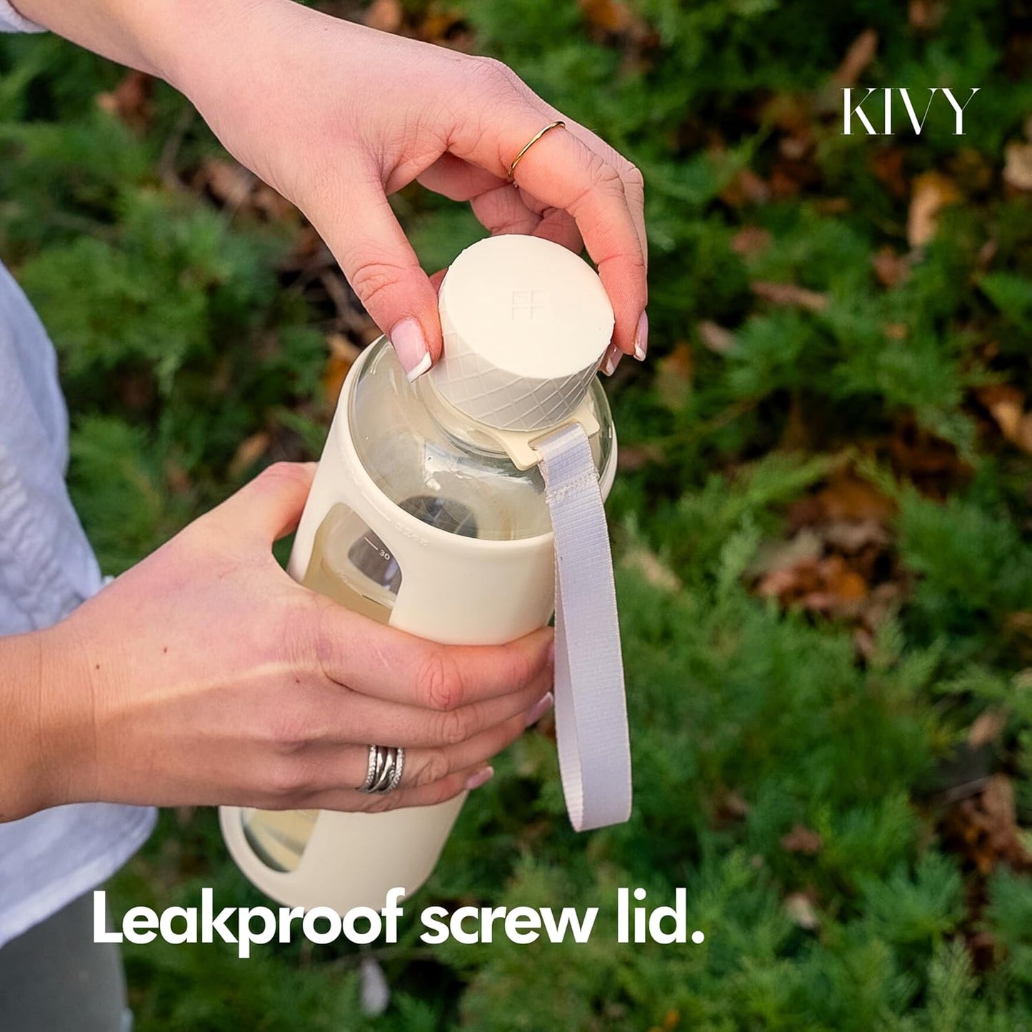 KIVY Glass Water Bottle with Silicone Sleeve 32 oz [WITH MEASUREMENT] - Borosilicate Glass Water Bottle Screw Top - Clear Bottles with Measurement Marking - Slim Waterbottle Aesthetic - Cream White